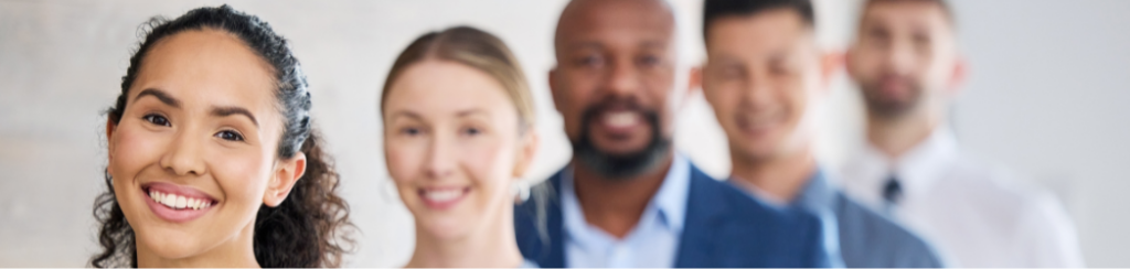 A group of happy employees that were positively affected by mental health posters