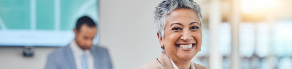 An employee happy with her company's career progression plan for employees